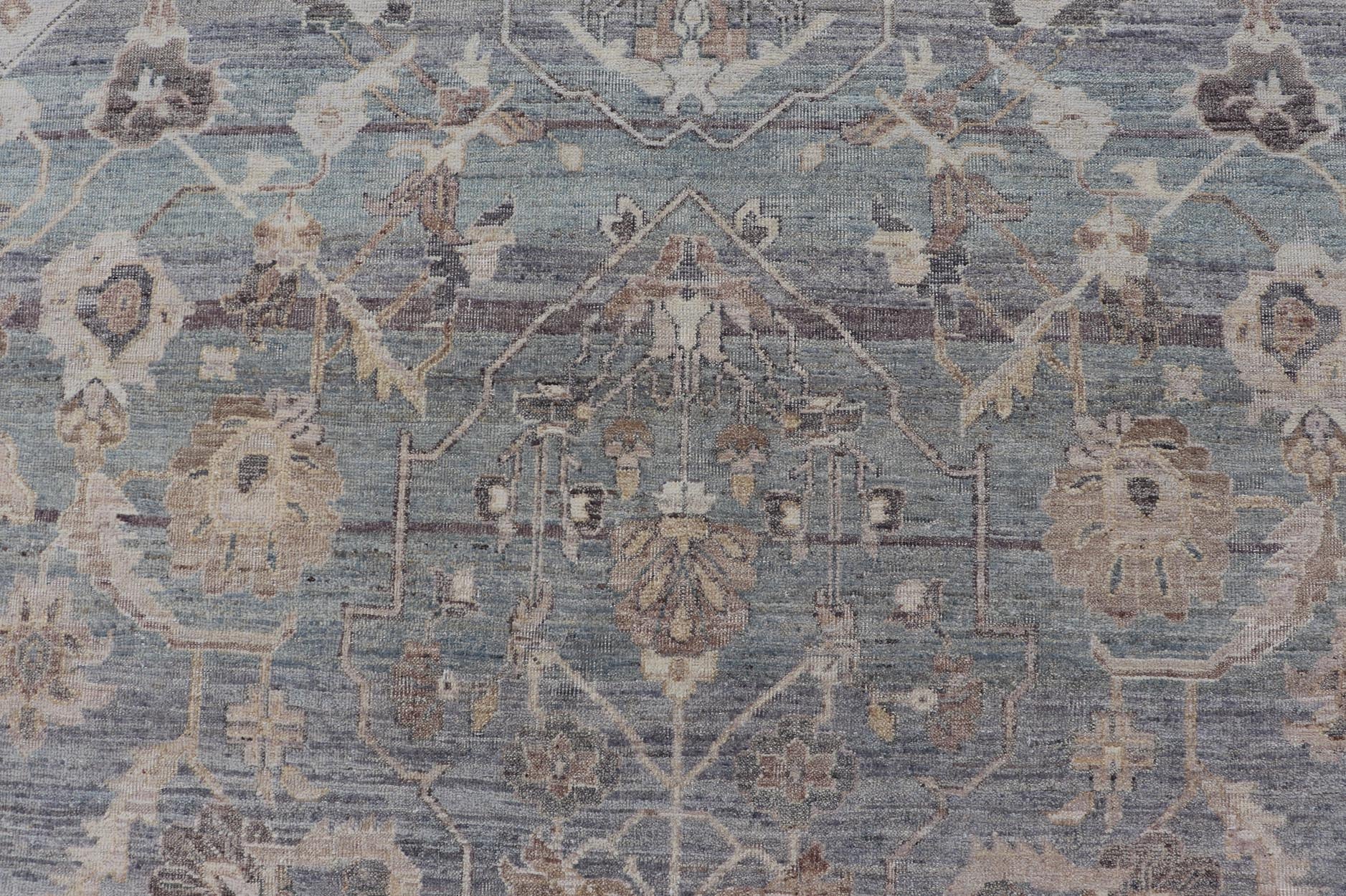 Modern Hand Knotted Oushak Muted Rug in Light Blue, Light Gray, and Cream. Keivan Woven Arts, rug/PUR - 21941, / country of origin / type: India/ Oushak Measures: 10'1 x 14'1 This hand knotted Oushak rug features a beautiful tribal design rendered ... - Keivan Woven ArtsPUR - 21941 - EA - 3009 - CS - 01 - 22446Rug