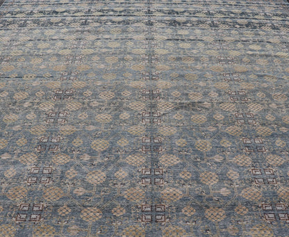 Modern All - Over Tribal Motif Khotan Area Rug in Dark Blues, Brown and Cream. Country of Origin: Afghanistan; Type: Khotan; Design: Floral, All - Over; Keivan Woven Arts: rug/PUR - 42561. Measures: 12'1 x 15'1 This modern Khotan features a modern da... - Keivan Woven ArtsPUR - 42561 - GS - 1016 - 22620Rug
