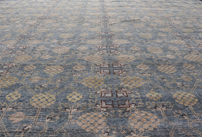 Modern All - Over Tribal Motif Khotan Area Rug in Dark Blues, Brown and Cream. Country of Origin: Afghanistan; Type: Khotan; Design: Floral, All - Over; Keivan Woven Arts: rug/PUR - 42561. Measures: 12'1 x 15'1 This modern Khotan features a modern da... - Keivan Woven ArtsPUR - 42561 - GS - 1016 - 22620Rug