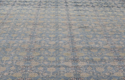Modern All - Over Tribal Motif Khotan Area Rug in Dark Blues, Brown and Cream. Country of Origin: Afghanistan; Type: Khotan; Design: Floral, All - Over; Keivan Woven Arts: rug/PUR - 42561. Measures: 12'1 x 15'1 This modern Khotan features a modern da... - Keivan Woven ArtsPUR - 42561 - GS - 1016 - 22620Rug