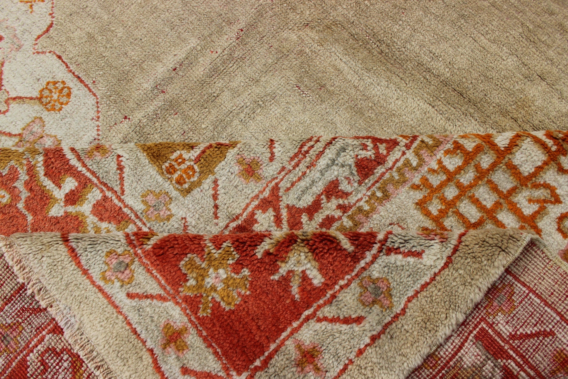 Large Antique Oushak Rug in Taupe/Light Green Background and Red Border Measures: 11'6 x 16. Taupe and sea - foam field patterned with a flawlessly floral motif frames one end of the carpet, which bears vase of flowers and floral motifs an... - Keivan Woven ArtsR20 - 0302 - 12825Rug