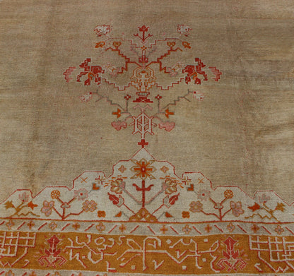 Large Antique Oushak Rug in Taupe/Light Green Background and Red Border Measures: 11'6 x 16. Taupe and sea - foam field patterned with a flawlessly floral motif frames one end of the carpet, which bears vase of flowers and floral motifs an... - Keivan Woven ArtsR20 - 0302 - 12825Rug