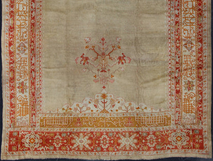 Large Antique Oushak Rug in Taupe/Light Green Background and Red Border Measures: 11'6 x 16. Taupe and sea - foam field patterned with a flawlessly floral motif frames one end of the carpet, which bears vase of flowers and floral motifs an... - Keivan Woven ArtsR20 - 0302 - 12825Rug