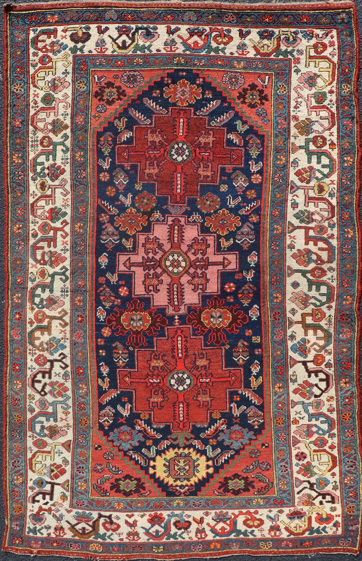 Antique Persian Kurdish Rug With Medallion Design in Blue, Red, and Ivory Rich vegetable colors in Blue and red Tribal Medallion design fine weave Kurdish antique rug from Persia, Keivan Woven Arts / rug R20 - 0503, country of origin / type: Iran ... - Keivan Woven ArtsR20 - 0503 - 12928Rug