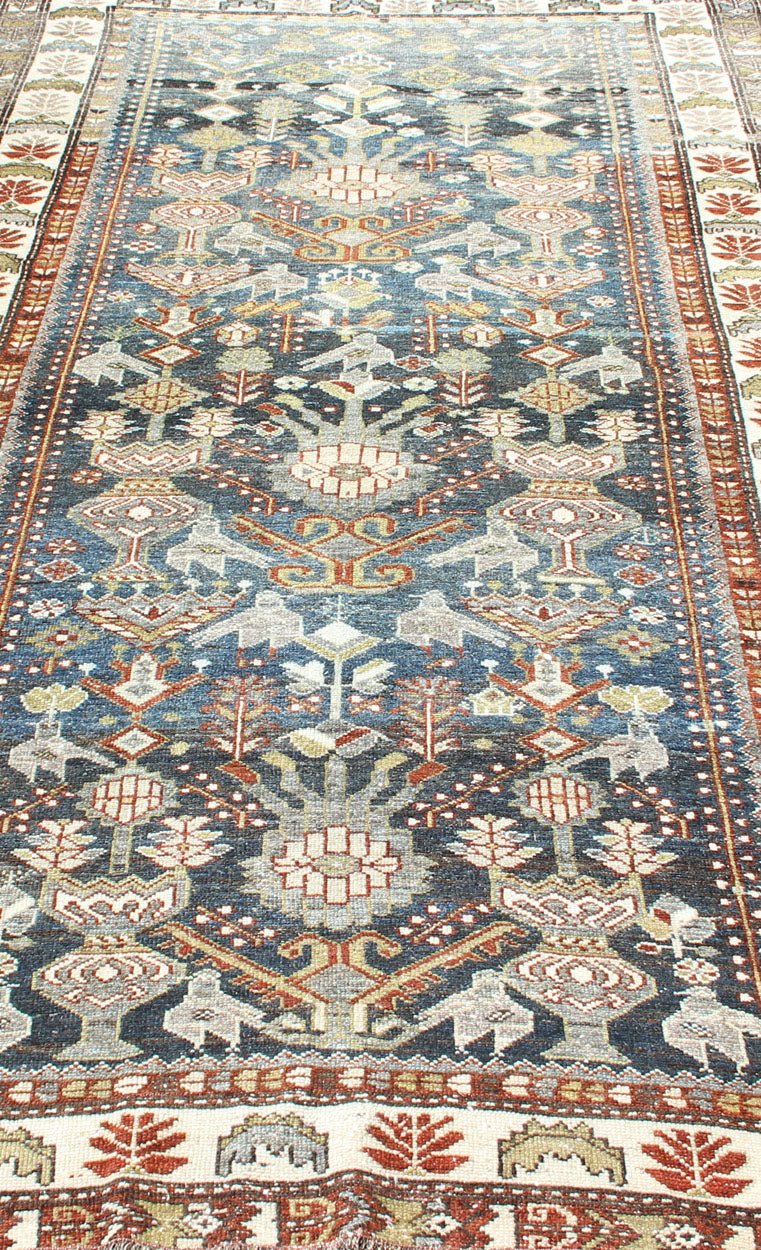 Antique Persian Bakhitari Rug with All - Over Patten in Steel Blue Background All - over Persian Earth antique Bakhtiari rug Geometric motifs and design Bakhtiari rug in steel blue and grayish - blue color tones, rug R20 - 0701, origin / type: Iran /... - Keivan Woven ArtsR20 - 0701 - 12938Rug