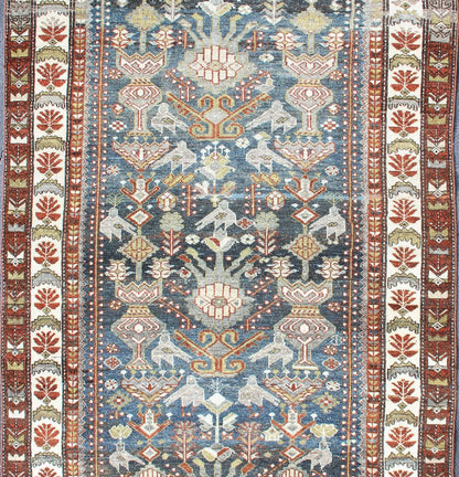 Antique Persian Bakhitari Rug with All - Over Patten in Steel Blue Background All - over Persian Earth antique Bakhtiari rug Geometric motifs and design Bakhtiari rug in steel blue and grayish - blue color tones, rug R20 - 0701, origin / type: Iran /... - Keivan Woven ArtsR20 - 0701 - 12938Rug