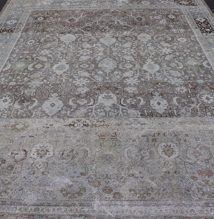 Ivory and Brown Antique Persian Mahal Rug with Floral Medallion Design Cream, brown, and green antique Persian Mahal rug with floral medallion design, rug R20 - 0707, country of origin / type: Iran / Mahal, circa 1920 This antique Persian ... - Keivan Woven ArtsR20 - 0707 - 12982Rug