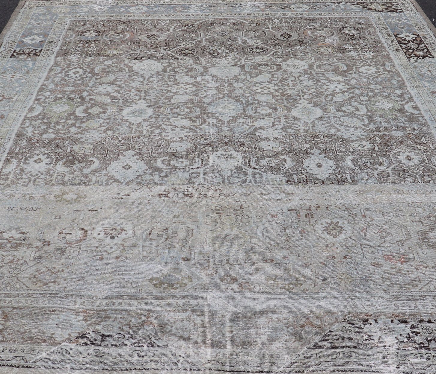 Ivory and Brown Antique Persian Mahal Rug with Floral Medallion Design Cream, brown, and green antique Persian Mahal rug with floral medallion design, rug R20 - 0707, country of origin / type: Iran / Mahal, circa 1920 This antique Persian ... - Keivan Woven ArtsR20 - 0707 - 12982Rug