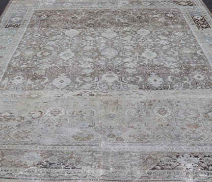 Ivory and Brown Antique Persian Mahal Rug with Floral Medallion Design Cream, brown, and green antique Persian Mahal rug with floral medallion design, rug R20 - 0707, country of origin / type: Iran / Mahal, circa 1920 This antique Persian ... - Keivan Woven ArtsR20 - 0707 - 12982Rug
