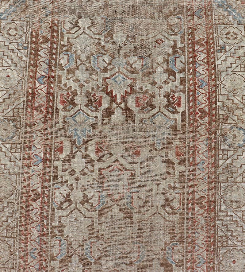 Antique Kurdish Runner in Soft Tones in Wool with All - Over Tribal Design Keivan Woven Arts / rug/R20 - 0708, country of origin / type: Iran / Kurdish, circa 1900. Measures: 3'0 x 8'1 This antique Persian Kurdish runner has been hand - knotted in ... - Keivan Woven ArtsR20 - 0708 - 12988Rug