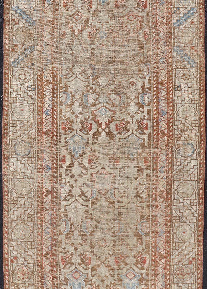 Antique Kurdish Runner in Soft Tones in Wool with All - Over Tribal Design Keivan Woven Arts / rug/R20 - 0708, country of origin / type: Iran / Kurdish, circa 1900. Measures: 3'0 x 8'1 This antique Persian Kurdish runner has been hand - knotted in ... - Keivan Woven ArtsR20 - 0708 - 12988Rug