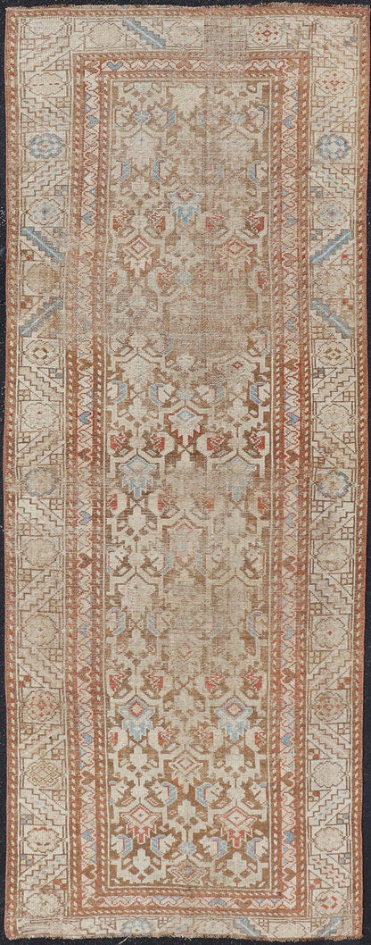 Antique Kurdish Runner in Soft Tones in Wool with All - Over Tribal Design Keivan Woven Arts / rug/R20 - 0708, country of origin / type: Iran / Kurdish, circa 1900. Measures: 3'0 x 8'1 This antique Persian Kurdish runner has been hand - knotted in ... - Keivan Woven ArtsR20 - 0708 - 12988Rug