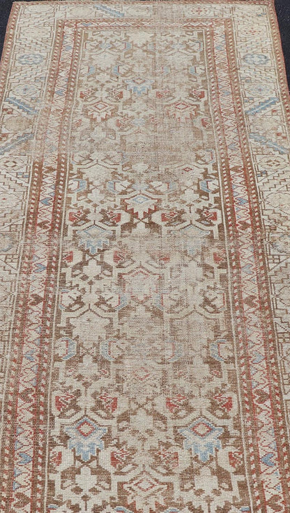 Antique Kurdish Runner in Soft Tones in Wool with All - Over Tribal Design Keivan Woven Arts / rug/R20 - 0708, country of origin / type: Iran / Kurdish, circa 1900. Measures: 3'0 x 8'1 This antique Persian Kurdish runner has been hand - knotted in ... - Keivan Woven ArtsR20 - 0708 - 12988Rug