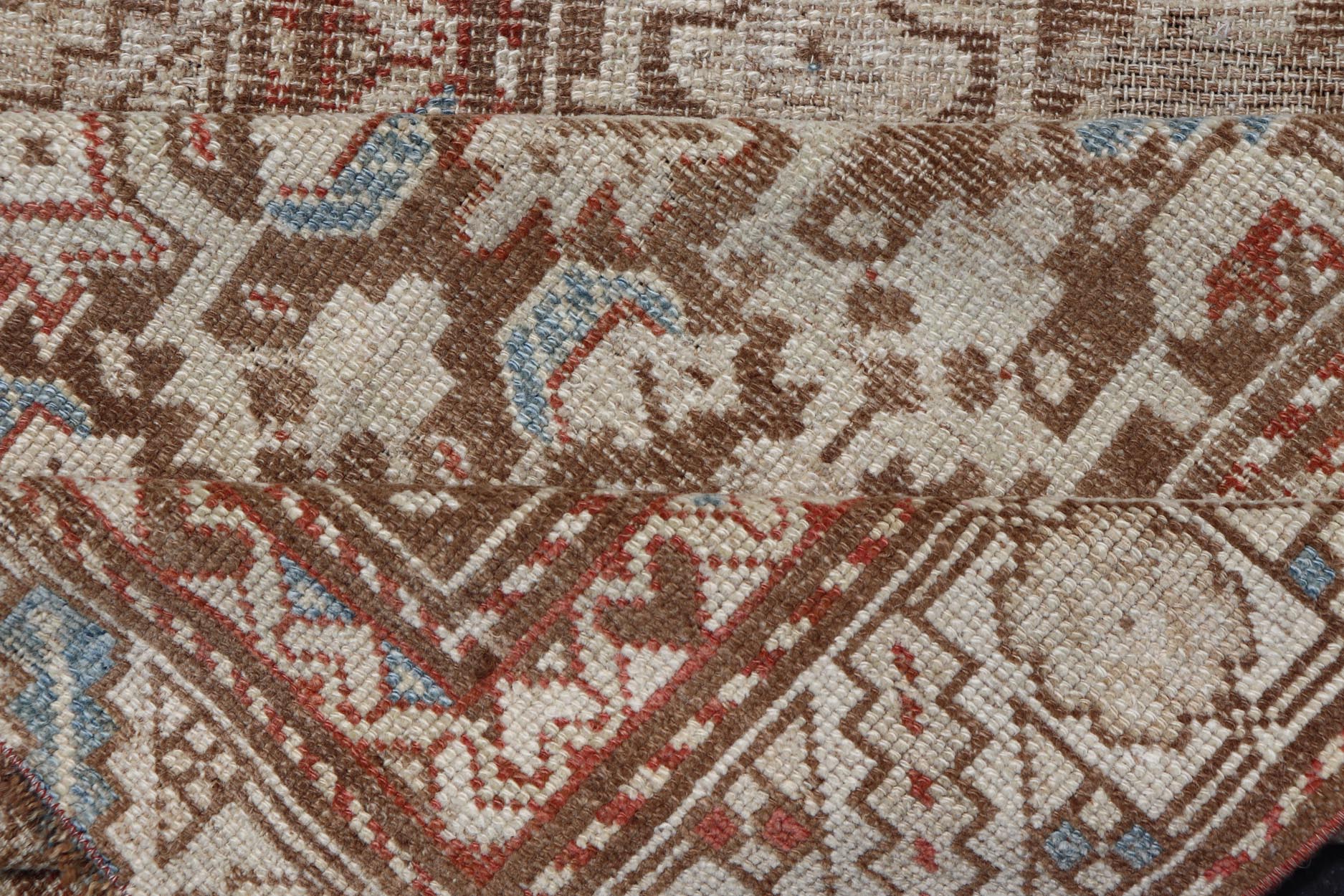 Antique Kurdish Runner in Soft Tones in Wool with All - Over Tribal Design Keivan Woven Arts / rug/R20 - 0708, country of origin / type: Iran / Kurdish, circa 1900. Measures: 3'0 x 8'1 This antique Persian Kurdish runner has been hand - knotted in ... - Keivan Woven ArtsR20 - 0708 - 12988Rug