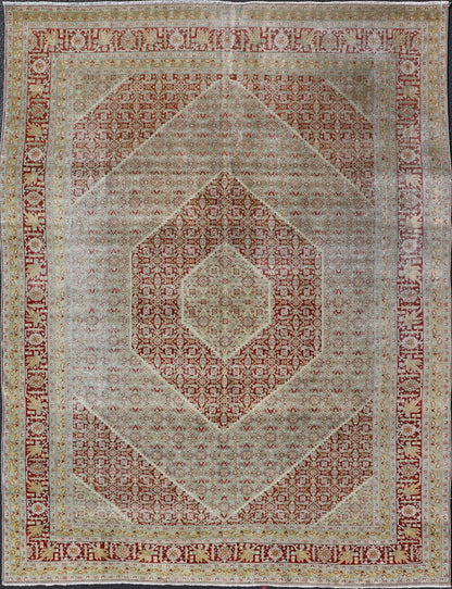Antique Persian Tabriz Distressed Carpet With Geometric Diamond Design Beautiful red, soft green, tan, light blue, gray, yellow Geometric Persian Tabriz rug, rug R20 - 0722, country of origin / type: Iran / Tabriz, circa 1920. This antique Tabr... - Keivan Woven ArtsR20 - 0722 - 12960