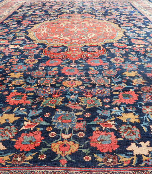 Mid 19th Century Antique Persian Bidjar Rug with Central Medallion on Navy Field. Colorful Antique Persian large Bidjar rug with central medallion and all over rose and flower pattern. set on a navy blue background, rug R20 - 0803, country of ori... - Keivan Woven ArtsR20 - 0803 - 13036