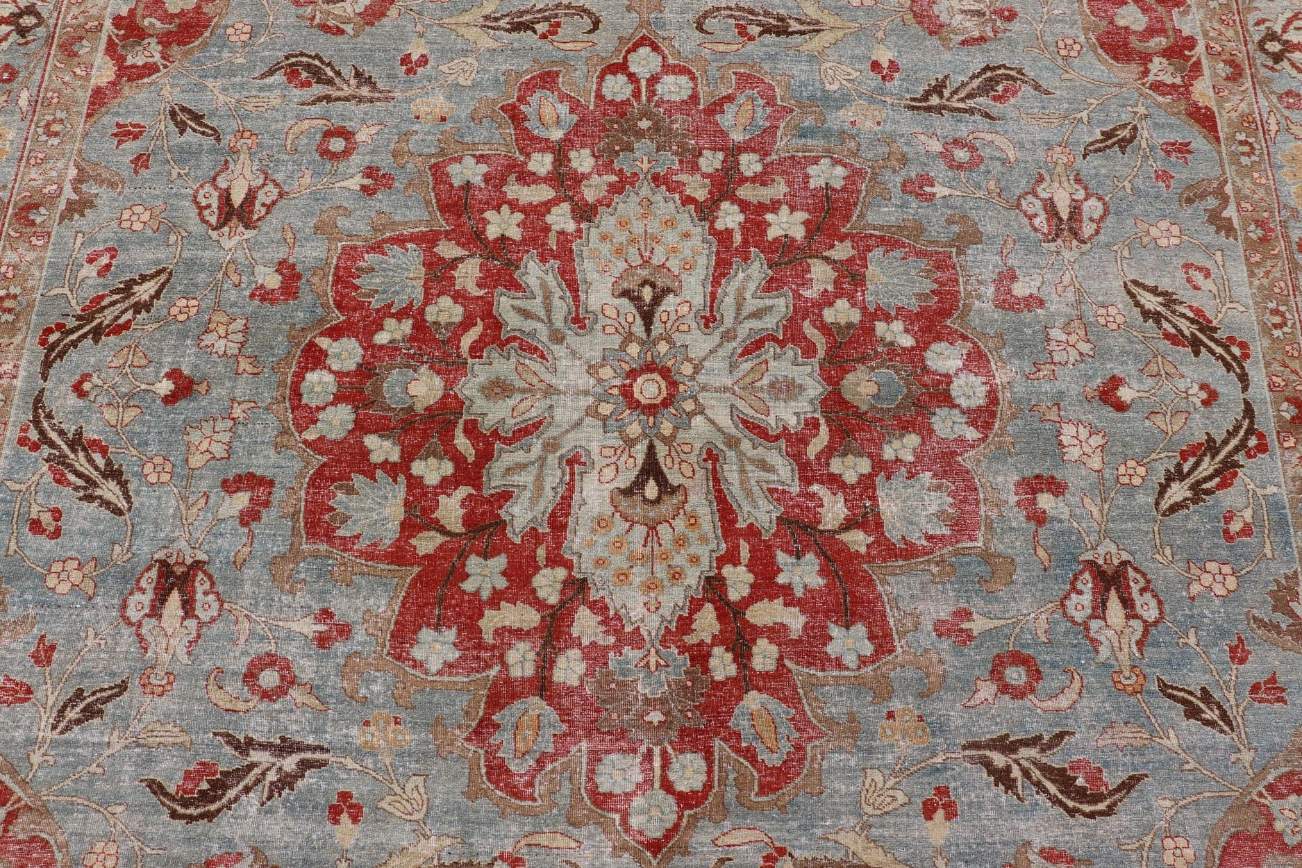 Measures: 11'2 x 17'2 Antique Persian Rug with Fine Weave Tabriz in Light Blue Background and Orange Finely woven antique Tabriz rug with circular, script - style medallion and blue field, Keivan Woven Arts / rug / R20 - 0804. Classic Persian r... - Keivan Woven ArtsR20 - 0804 - 13098Rug