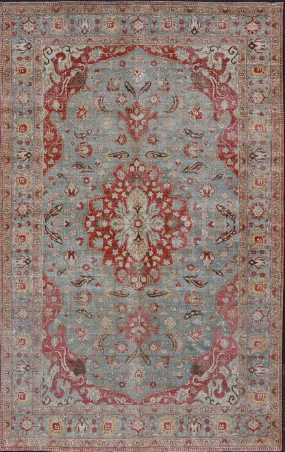 Measures: 11'2 x 17'2 Antique Persian Rug with Fine Weave Tabriz in Light Blue Background and Orange Finely woven antique Tabriz rug with circular, script - style medallion and blue field, Keivan Woven Arts / rug / R20 - 0804. Classic Persian r... - Keivan Woven ArtsR20 - 0804 - 13098Rug