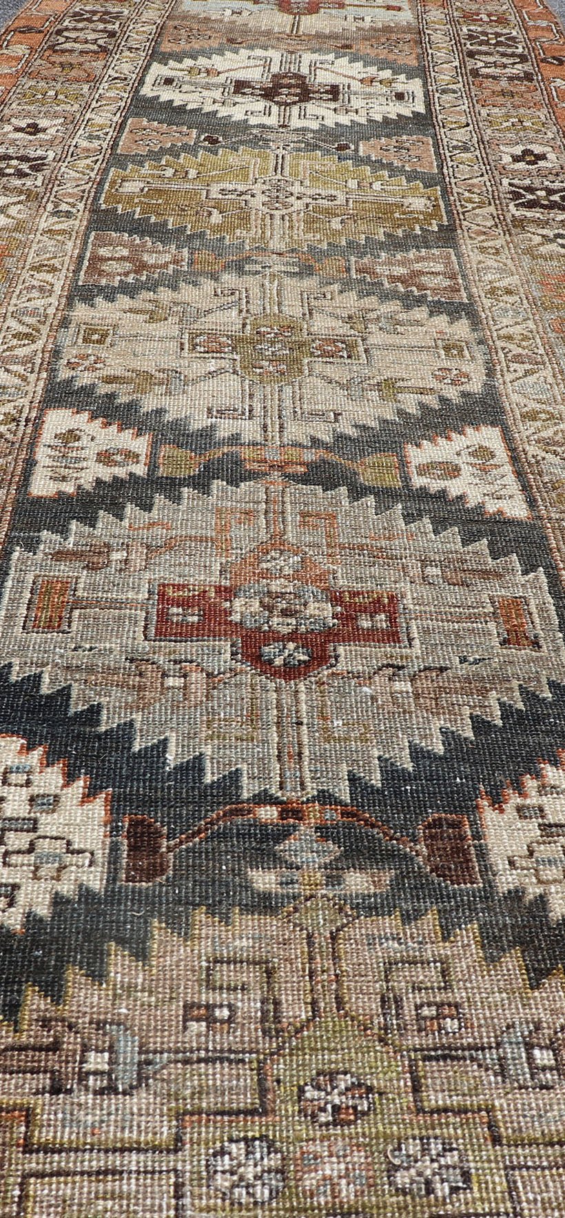 Distressed Persian Heriz - Serapi Runner with Multi Medallions in charcoal, green, terracotta, red, taupe, salmon. Distressed antique runner, distressed Persian runner, Persian distressed rug Heriz Searpi runner with multi - medallion and geometric ... - Keivan Woven ArtsR20 - 0808 - 13176