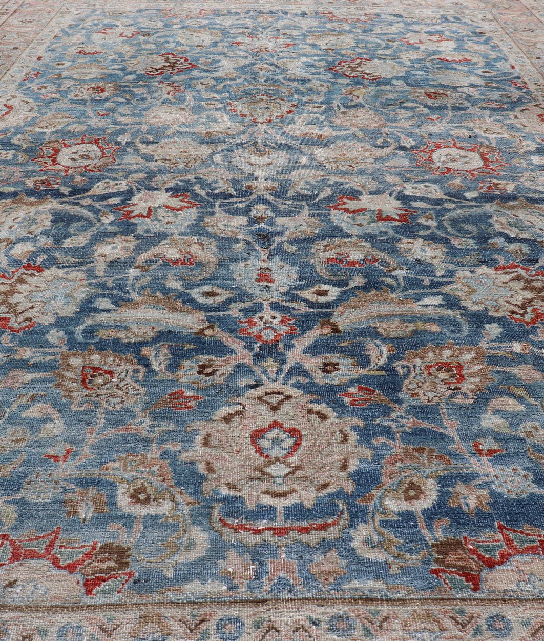 Antique Persian Mashad with Medium in Boteh Blue Background, Salmon Border Antique Persian Mashad rug with blue background and light rose border. Rug / R20 - 0824 Mashad is a major city in the north eastern Iran, located in the Khorossan Provin... - Keivan Woven ArtsR20 - 0824 - 13250