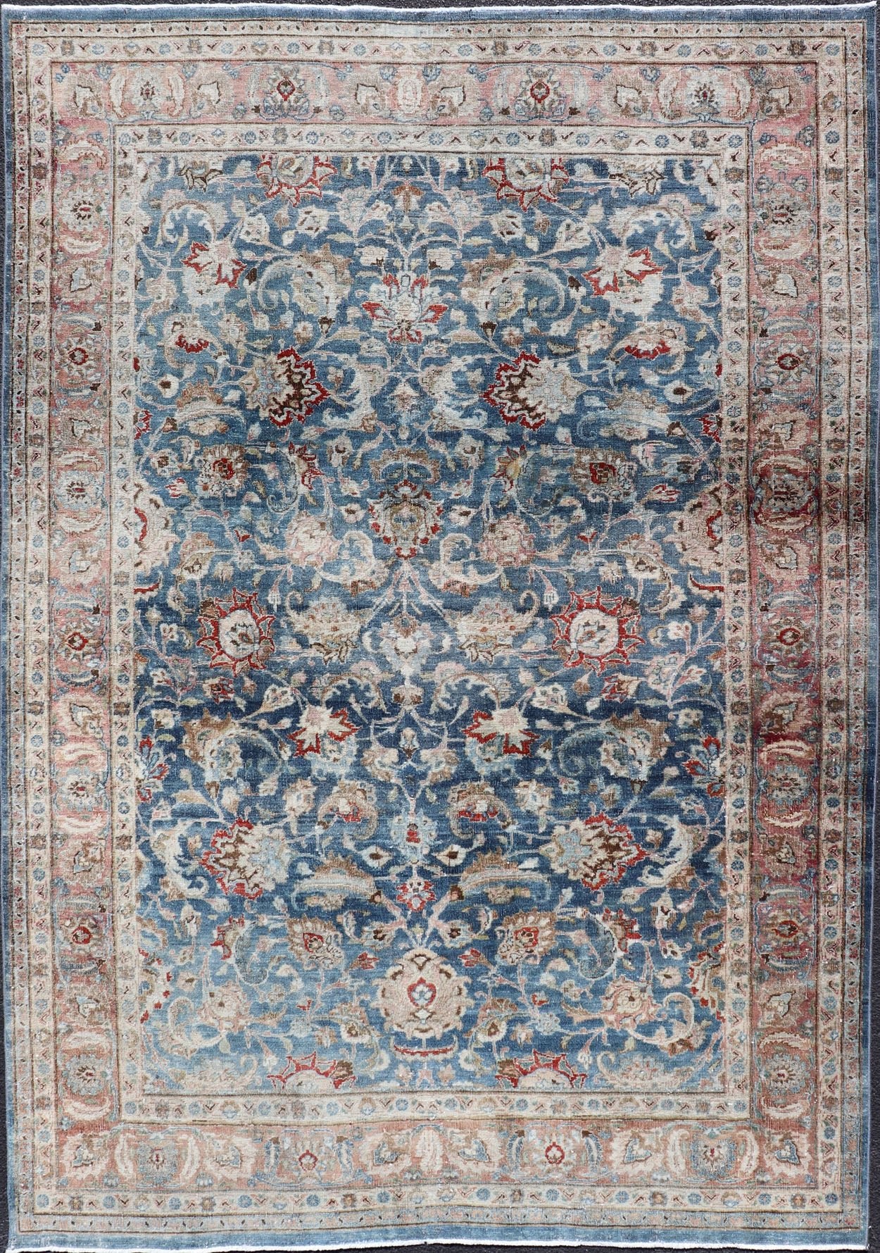 Antique Persian Mashad with Medium in Boteh Blue Background, Salmon Border Antique Persian Mashad rug with blue background and light rose border. Rug / R20 - 0824 Mashad is a major city in the north eastern Iran, located in the Khorossan Provin... - Keivan Woven ArtsR20 - 0824 - 13250