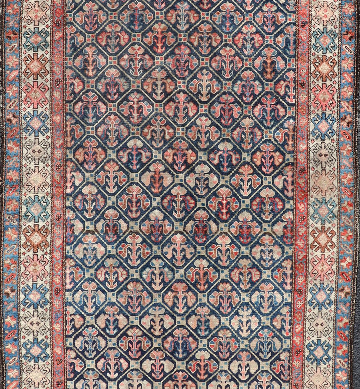 Tribal Persian Hamedan Rug in Blue, Red, Brown, and Ivory Tribal Persian Hamedan rug in midnight blue, red, cream. Keivan Woven Arts / rug R20 - 0838, country of origin / type: Iran / Hamedan, circa 1920 This Persian Hamedan features a uniq... - Keivan Woven ArtsR20 - 0838 - 13336Rug