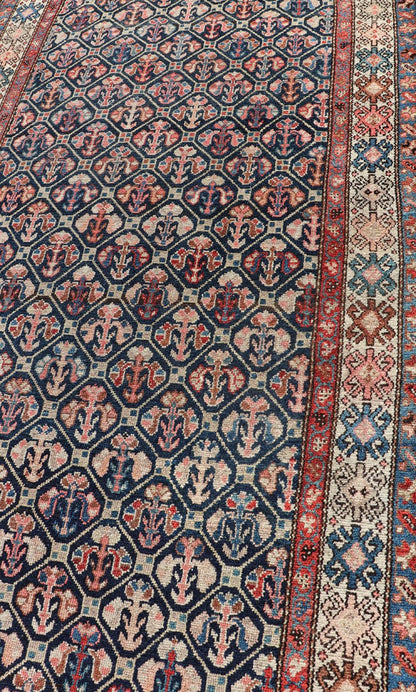 Tribal Persian Hamedan Rug in Blue, Red, Brown, and Ivory Tribal Persian Hamedan rug in midnight blue, red, cream. Keivan Woven Arts / rug R20 - 0838, country of origin / type: Iran / Hamedan, circa 1920 This Persian Hamedan features a uniq... - Keivan Woven ArtsR20 - 0838 - 13336Rug