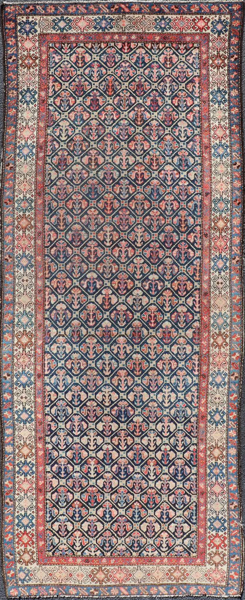 Tribal Persian Hamedan Rug in Blue, Red, Brown, and Ivory Tribal Persian Hamedan rug in midnight blue, red, cream. Keivan Woven Arts / rug R20 - 0838, country of origin / type: Iran / Hamedan, circa 1920 This Persian Hamedan features a uniq... - Keivan Woven ArtsR20 - 0838 - 13336Rug