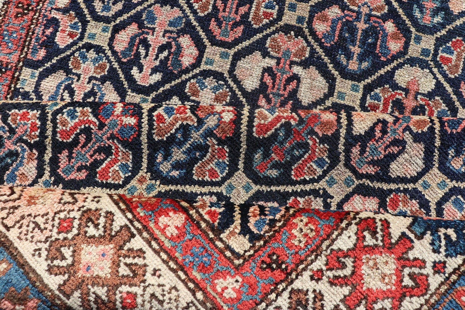 Tribal Persian Hamedan Rug in Blue, Red, Brown, and Ivory Tribal Persian Hamedan rug in midnight blue, red, cream. Keivan Woven Arts / rug R20 - 0838, country of origin / type: Iran / Hamedan, circa 1920 This Persian Hamedan features a uniq... - Keivan Woven ArtsR20 - 0838 - 13336Rug