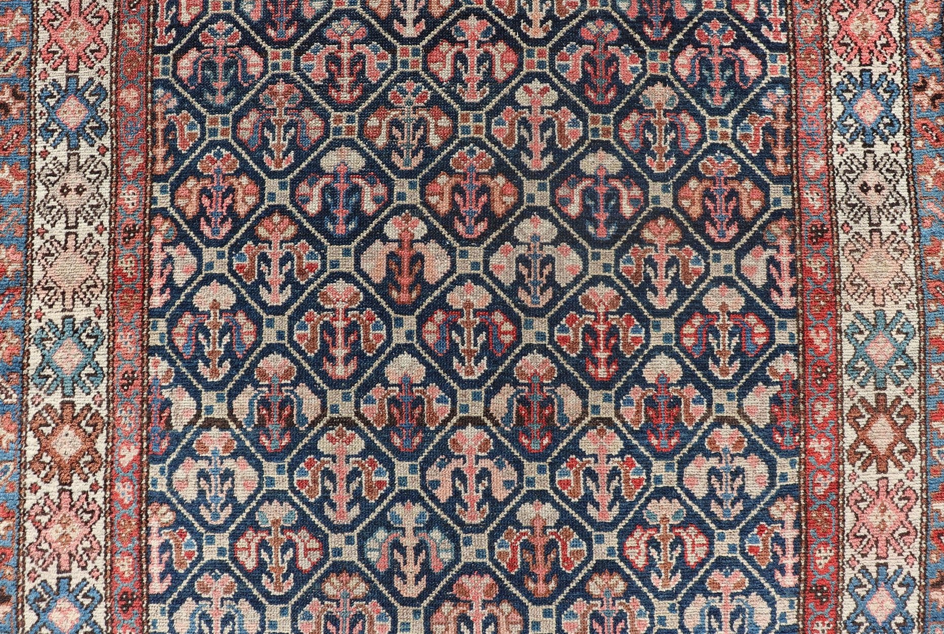 Tribal Persian Hamedan Rug in Blue, Red, Brown, and Ivory Tribal Persian Hamedan rug in midnight blue, red, cream. Keivan Woven Arts / rug R20 - 0838, country of origin / type: Iran / Hamedan, circa 1920 This Persian Hamedan features a uniq... - Keivan Woven ArtsR20 - 0838 - 13336Rug