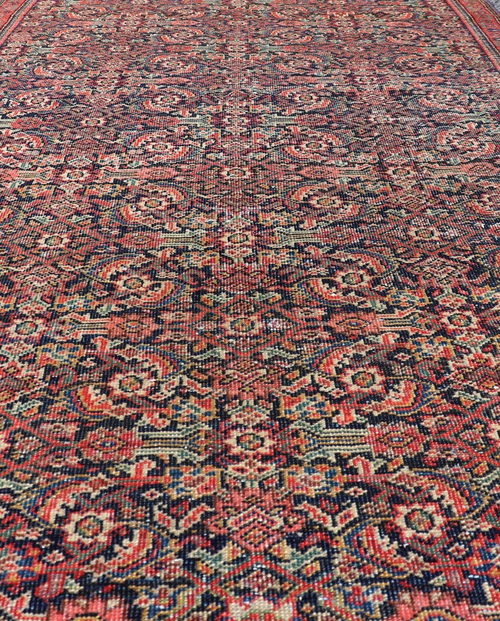 Antique Faraghan Fine Persian Rug in Navy Color Background And Jewel Tones. Keivan Woven Arts / Rug / R20 - 1003 / Type / Iran / Faraghan / Circa Early 20th Century. Measures: 2'10 x 5'6 This exquisite antique Faraghan fine Persian rug displays a ... - Keivan Woven ArtsR20 - 1003 - 14088Rug