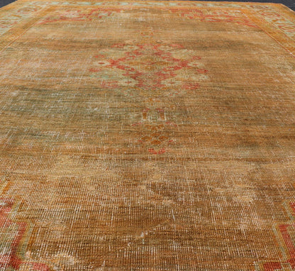 Antique Turkish Oushak Keivan Woven Arts With Medallion in Green, Coral, L. Blue & Marigold. Keivan Woven Arts / rug / R20 - 1015, country of origin / type: Turkey / Oushak, circa 1900 Measures: 8'10 x 12'4 This diverse and beautiful 1900'... - Keivan Woven ArtsR20 - 1015 - 14152Rug