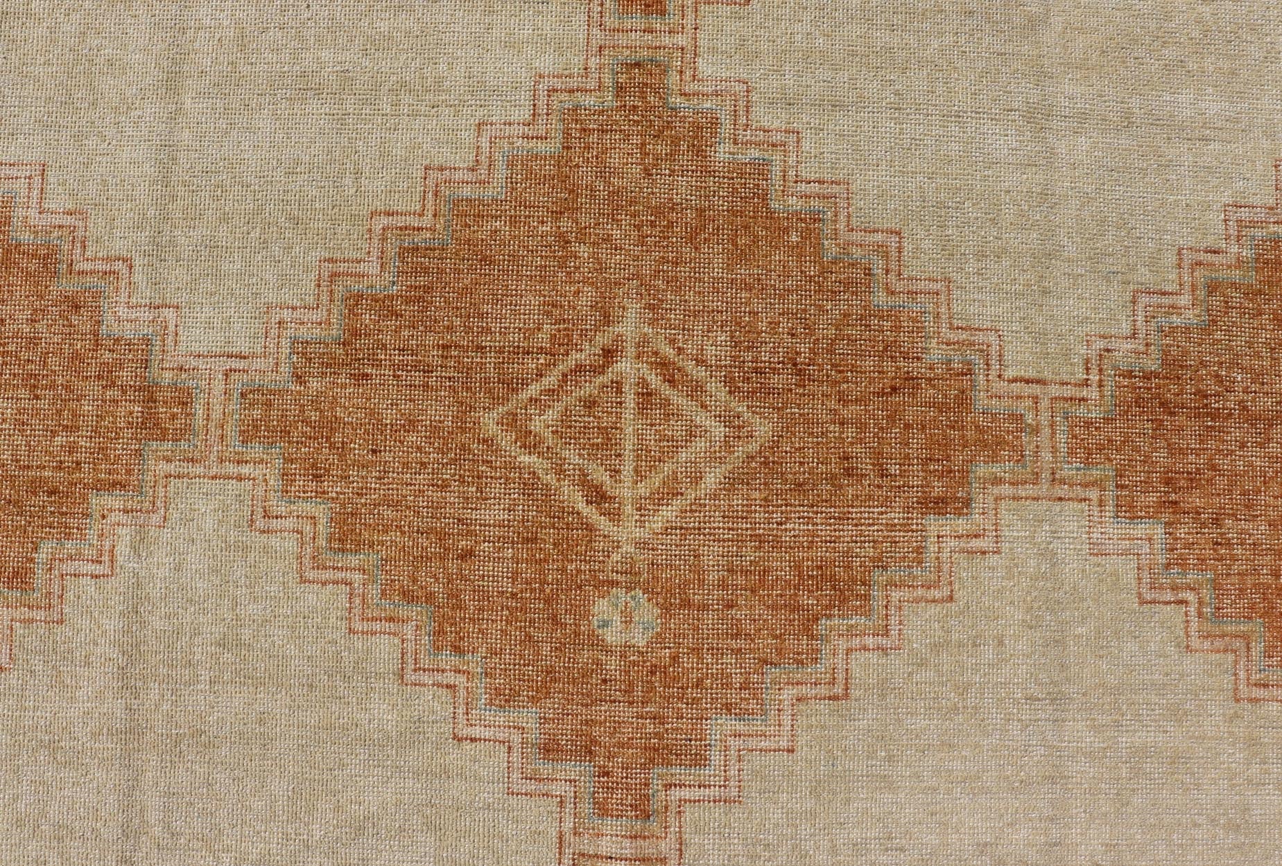 Distressed Modern Khotan Design Rug with Diamond & Geometric Pattern In Ivory, Burnt Orange, light green, light blue and yellow colors. Keivan Woven Arts/ rug RJK - 24848 - JPR - 011 - 01 country of origin / type: India / Khotan 21st Century. Measures: ... - Keivan Woven ArtsRJK - 24848 - JPR - 011 - 01 - 21535Rug
