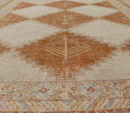 Distressed Modern Khotan Design Rug with Diamond & Geometric Pattern In Ivory, Burnt Orange, light green, light blue and yellow colors. Keivan Woven Arts/ rug RJK - 24848 - JPR - 011 - 01 country of origin / type: India / Khotan 21st Century. Measures: ... - Keivan Woven ArtsRJK - 24848 - JPR - 011 - 01 - 21535Rug
