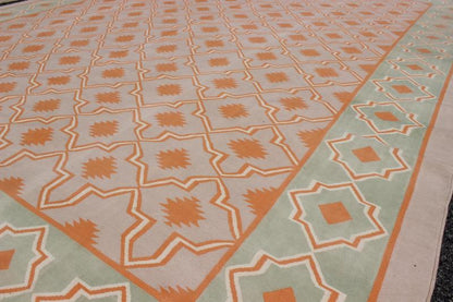 Large Vintage Cotton Dhurrie Designer Rug In Shades of Orange and Mint Green. Keivan Woven Arts / rug ROD - 5254, country of origin / type: India / Dhurrie, circa 1960 Measures: 11'6 x 14'6. Woven during the mid - 20th century, this designer, flat - wo... - Keivan Woven ArtsROD - 5254 - 7621Rug