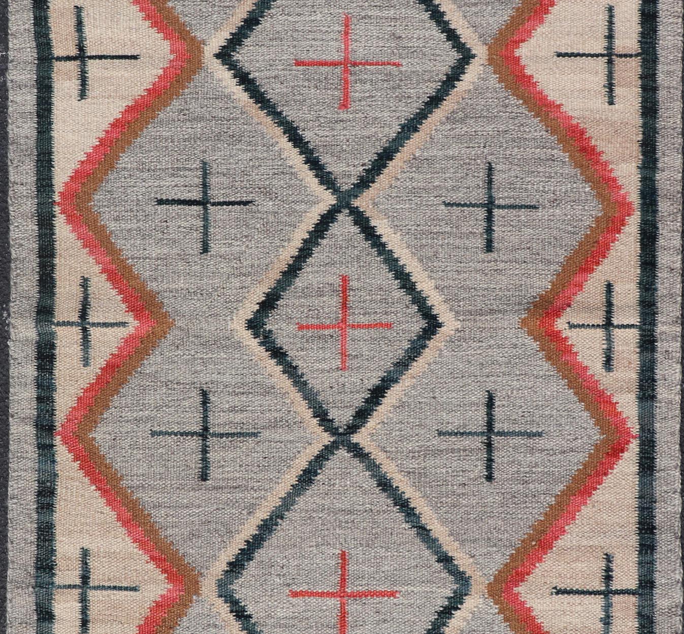 Modern Navajo Rug with Entwined Tribal Design in Gray, Red, Charcoal, And Ivory. Keivan Woven Arts / rug RSC - 67815 - AR - 113, country of origin India, type: North America / Navajo, circa early 21st century Measures: 3'1 x 5'0 This intriguing contem... - Keivan Woven ArtsRSC - 67815 - AR - 113 - 25236Rug