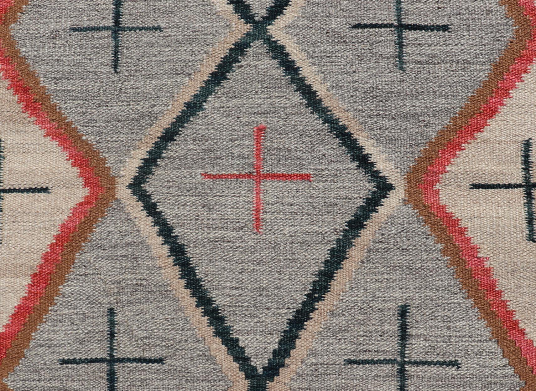 Modern Navajo Rug with Entwined Tribal Design in Gray, Red, Charcoal, And Ivory. Keivan Woven Arts / rug RSC - 67815 - AR - 113, country of origin India, type: North America / Navajo, circa early 21st century Measures: 3'1 x 5'0 This intriguing contem... - Keivan Woven ArtsRSC - 67815 - AR - 113 - 25236Rug
