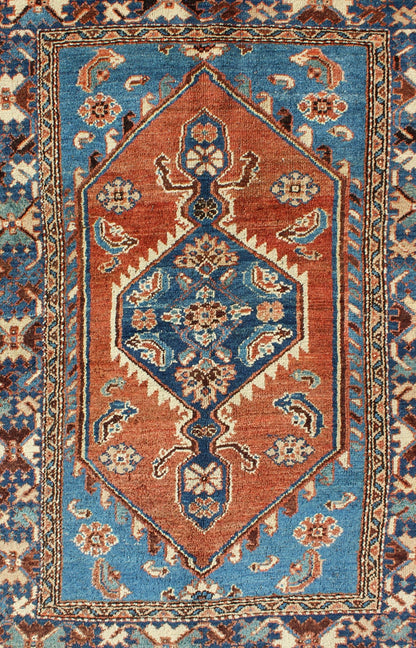 Antique Persian Karadjeh rug with tribal medallion in rust red and bright blue, rugs 12 - 0104, country of origin / type: Iran / Karadjeh, circa 1910. This early 20th century, handwoven antique Persian Karadjeh rug features a rust red - colored fiel... - Keivan Woven ArtsS12 - 0104 - 3223Rug