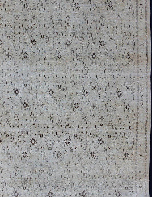 Large antique Persian Tabriz rug with all - over design in cream and brown accents. Keivan Woven Arts / rug S12 - 0408, country of origin / type: Iran / Tabriz, circa 1900. Measures: 10'8 x 14'9. Tabriz rugs are distinguished by their excellent wea... - Keivan Woven ArtsS12 - 0408 - 3235Rug