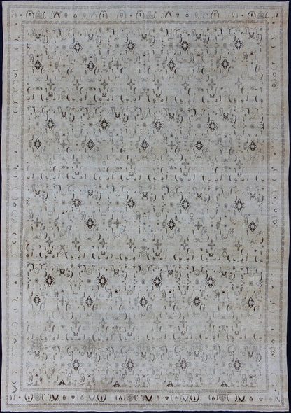 Large antique Persian Tabriz rug with all - over design in cream and brown accents. Keivan Woven Arts / rug S12 - 0408, country of origin / type: Iran / Tabriz, circa 1900. Measures: 10'8 x 14'9. Tabriz rugs are distinguished by their excellent wea... - Keivan Woven ArtsS12 - 0408 - 3235Rug