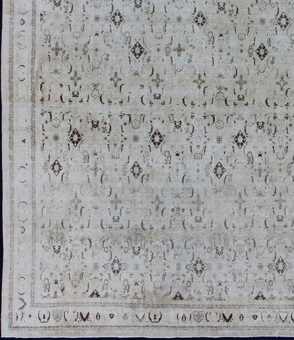 Large antique Persian Tabriz rug with all - over design in cream and brown accents. Keivan Woven Arts / rug S12 - 0408, country of origin / type: Iran / Tabriz, circa 1900. Measures: 10'8 x 14'9. Tabriz rugs are distinguished by their excellent wea... - Keivan Woven ArtsS12 - 0408 - 3235Rug