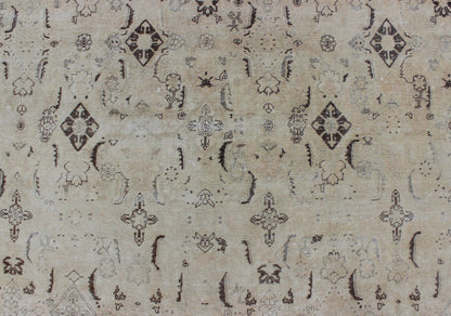 Large antique Persian Tabriz rug with all - over design in cream and brown accents. Keivan Woven Arts / rug S12 - 0408, country of origin / type: Iran / Tabriz, circa 1900. Measures: 10'8 x 14'9. Tabriz rugs are distinguished by their excellent wea... - Keivan Woven ArtsS12 - 0408 - 3235Rug