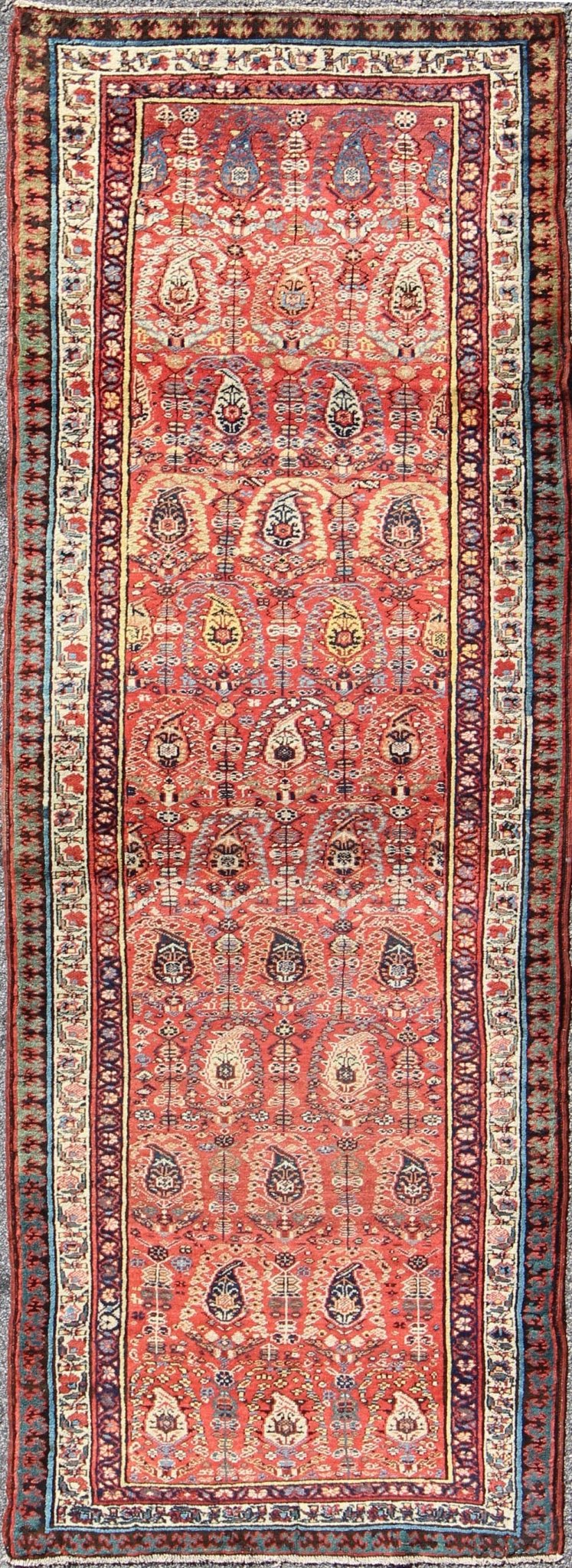 Antique Persian Serab Runner This all - over Persian Serab has a terra cotta background and an ivory border. The elegant design in the field consists of a free - flowing Paisley pattern. The blue, greens and yellows add a hint of color to this stunn... - Keivan Woven ArtsS12 - 0503 - 4090Rug