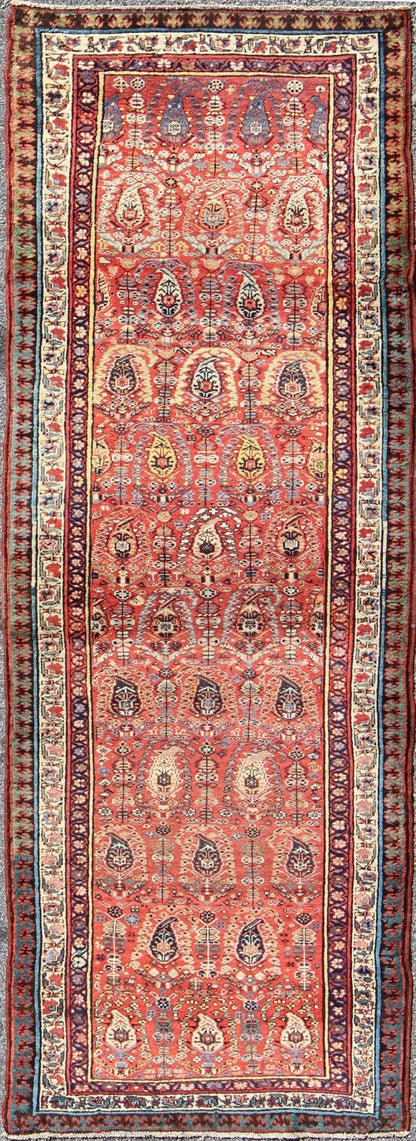 Antique Persian Serab Runner This all - over Persian Serab has a terra cotta background and an ivory border. The elegant design in the field consists of a free - flowing Paisley pattern. The blue, greens and yellows add a hint of color to this stunn... - Keivan Woven ArtsS12 - 0503 - 4090Rug