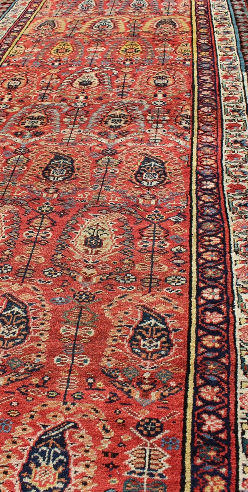 Antique Persian Serab Runner This all - over Persian Serab has a terra cotta background and an ivory border. The elegant design in the field consists of a free - flowing Paisley pattern. The blue, greens and yellows add a hint of color to this stunn... - Keivan Woven ArtsS12 - 0503 - 4090Rug
