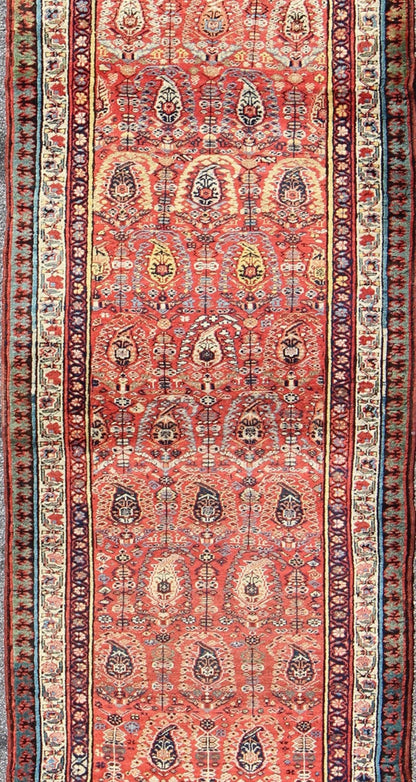 Antique Persian Serab Runner This all - over Persian Serab has a terra cotta background and an ivory border. The elegant design in the field consists of a free - flowing Paisley pattern. The blue, greens and yellows add a hint of color to this stunn... - Keivan Woven ArtsS12 - 0503 - 4090Rug