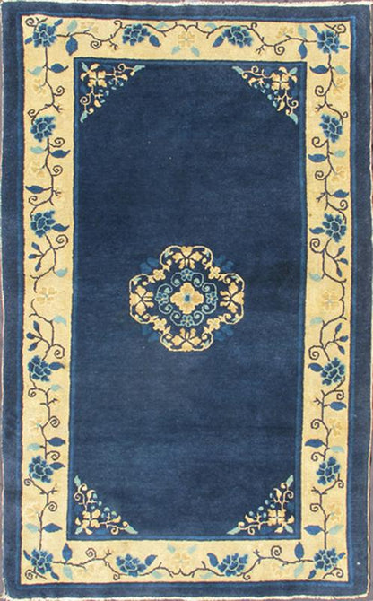 Antique Chinese Peking Carpet The saturated blue field of this piece forms a vibrant backdrop for a medallion with four - corner lotus blossom flowers, which were symbols of purity and spirituality in Buddhist traditions. An unusual interlocking f... - Keivan Woven ArtsS12 - 0510 - 3245Rug