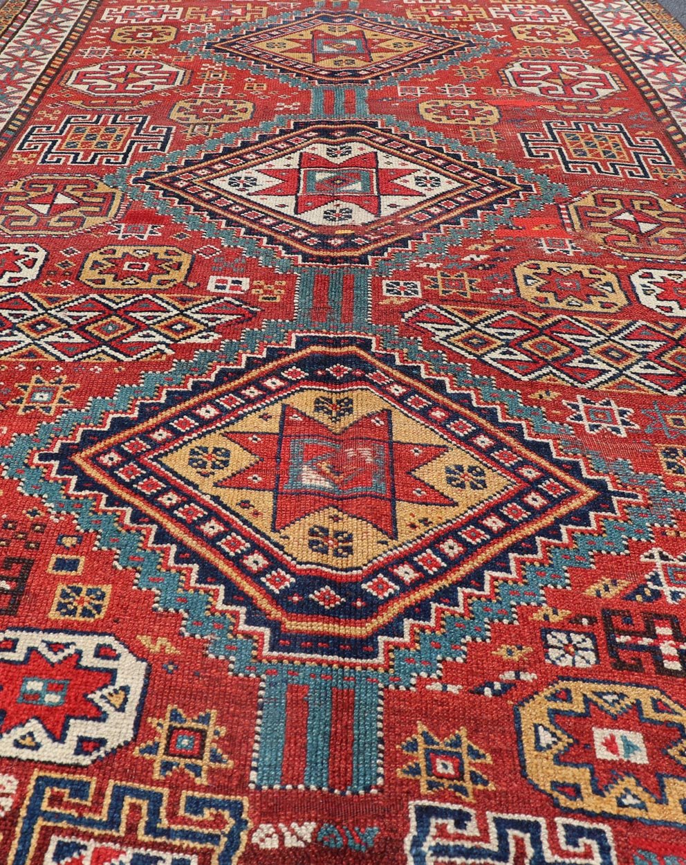 Antique Qashqai Rug with Geometric Motifs in Red, Blue, and Golden Yellow This stunning 19th century Qashqai rug from the central region of Persia displays three magnificent, geometric central medallions and an all - over geometric design. A dynam... - Keivan Woven ArtsS12 - 0518 - 3998Rug