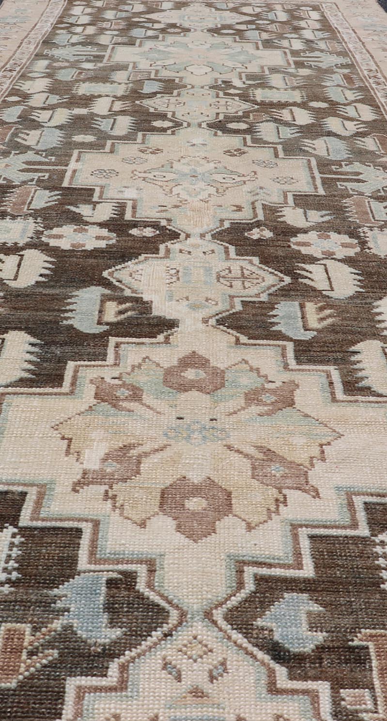Antique Kazak Runner with Geometric Design And Medallions On A Brown Field Country of Origin: Caucasus Type: Kazak Design: medallion, Sub - Geometric, Early 20th century, Keivan Woven Arts; rug S12 - 0519 Measures: 3'2 x 8'7 This piece was h... - Keivan Woven ArtsS12 - 0519 - 3263Rug