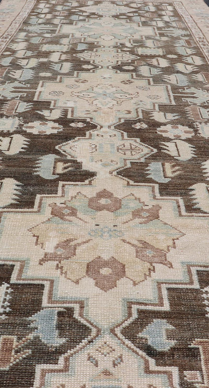 Antique Kazak Runner with Geometric Design And Medallions On A Brown Field Country of Origin: Caucasus Type: Kazak Design: medallion, Sub - Geometric, Early 20th century, Keivan Woven Arts; rug S12 - 0519 Measures: 3'2 x 8'7 This piece was h... - Keivan Woven ArtsS12 - 0519 - 3263Rug